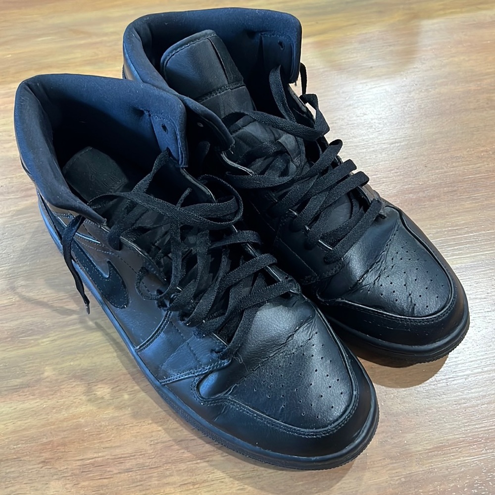 All black Jordan 1s